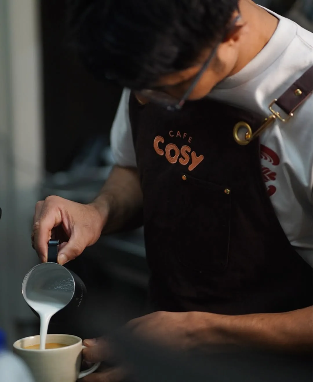 Coffee being poured at Cafe Cosy Moss Vale